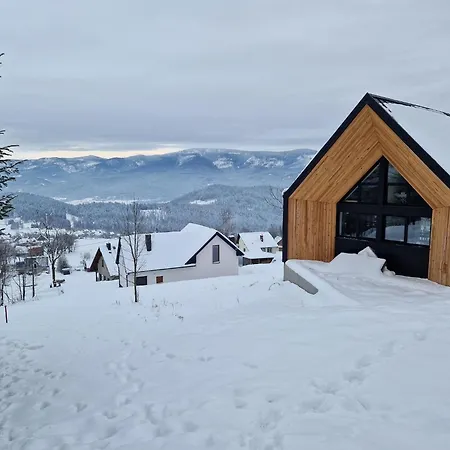 House With A Garden And A View Of The Mountains